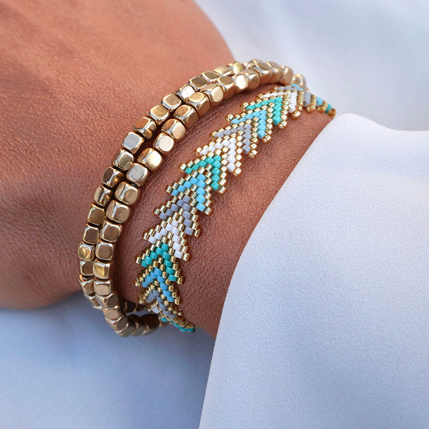 Aqua Glow bracelet set worn on wrist
