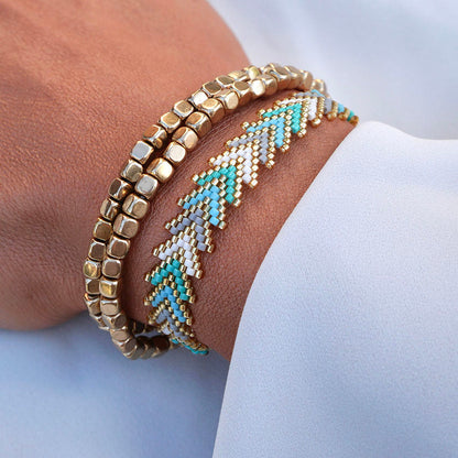 Aqua Glow bracelet set worn on wrist